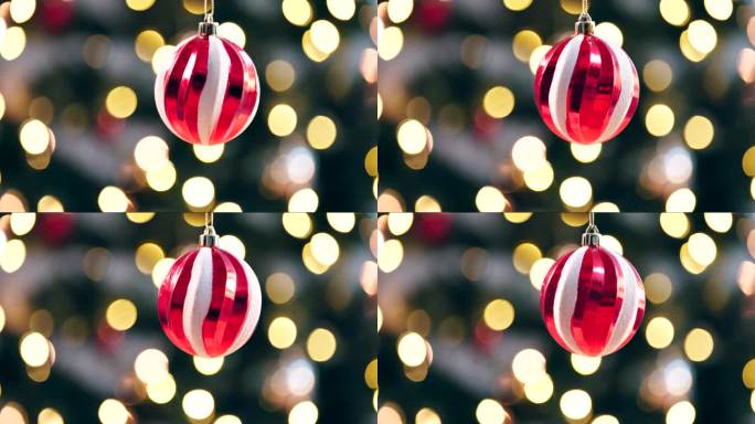 圣诞球，金色散景和装饰闪耀在节日节日，庆祝活动和节日在家里。派对装饰，插图和圣诞彩纸闪烁的灯和闪耀在
