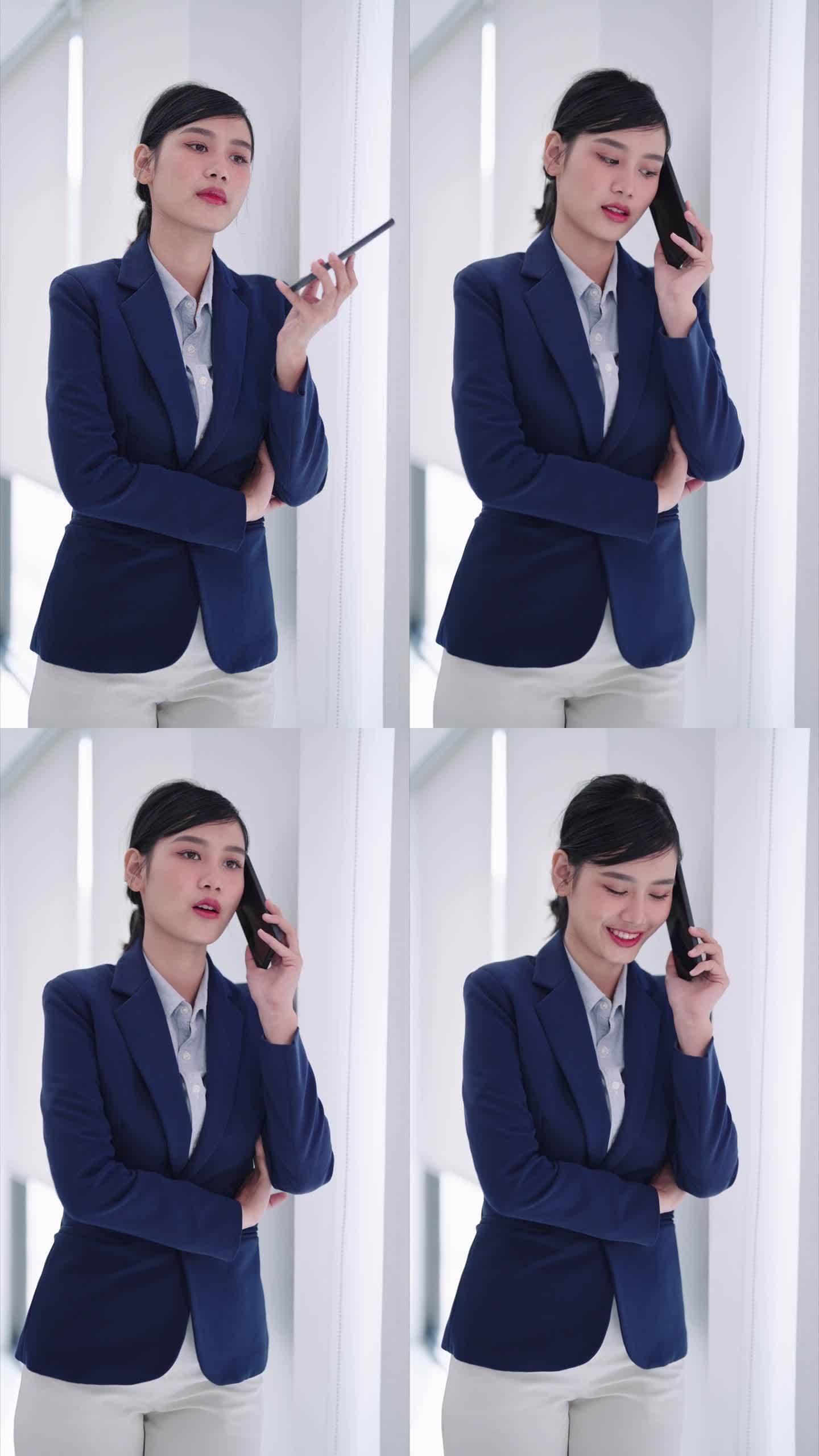 一位亚洲女商人在现代办公风格的环境中与朋友通电话。为商务女性展示现代办公沟通。专业和时尚。