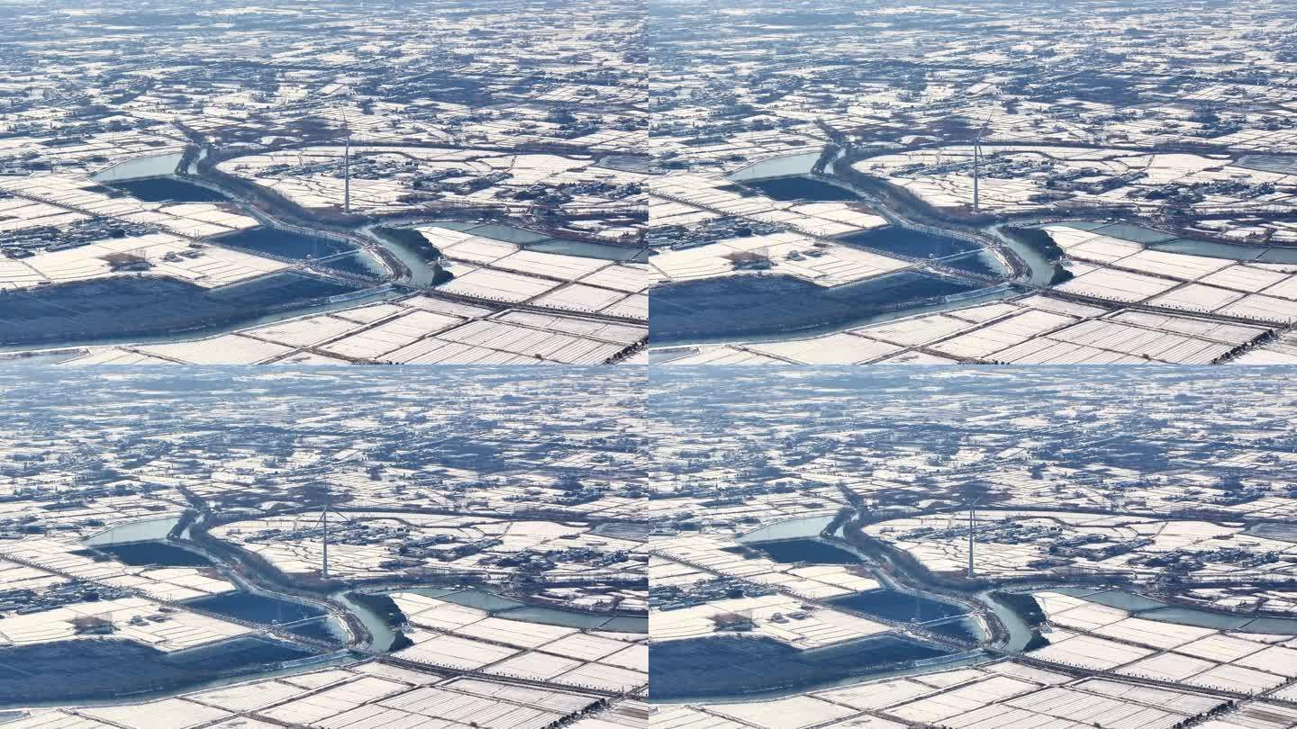 航拍乡镇雪景学校建筑田地大桥别墅河流房屋