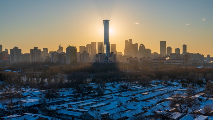 北京中国尊日落光影雪景