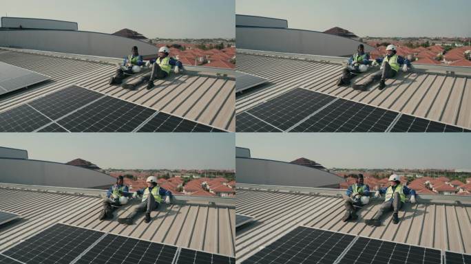 高效协作:技术工人确保太阳能发电性能。