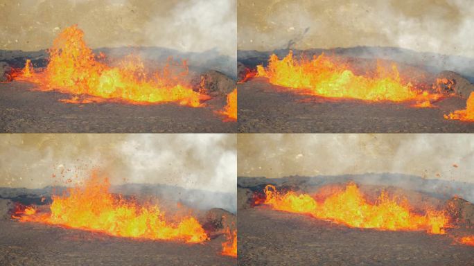 极热的岩浆沸腾的特写镜头。冰岛火山爆发。岩浆从地下涌出。慢动作视图。火山坑。