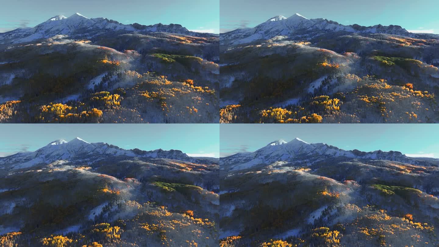霜脆冷冻冻的早晨第一缕光Kebler Pass科罗拉多州空中电影无人机秋天冬天碰撞第一白色的雪红黄橙