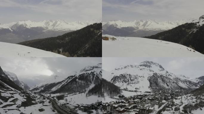 航拍阿尔卑斯山脚下的小镇雪景法国冬季村庄
