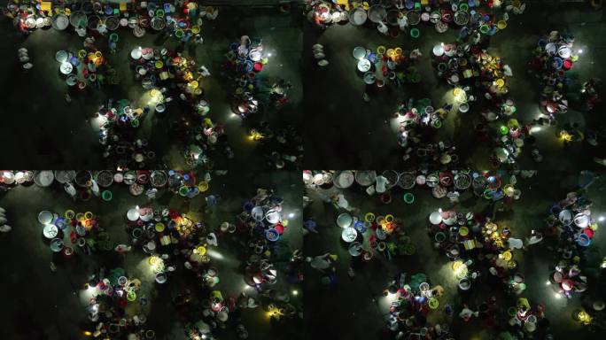 鸟瞰越南后江省湄公河三角洲的露天夜市