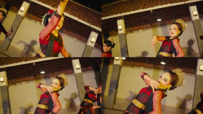 一群舞蹈演员在亭子里表演传统的印尼舞蹈，动作灵活