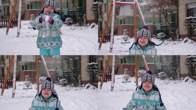 冬天的乐趣和玩可爱的孩子小女孩喜欢扔扔扔起一个雪，它落在慢动作