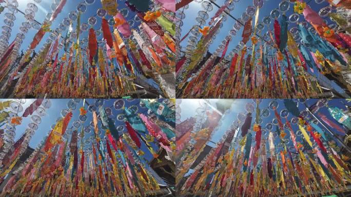 在泰国伦番的寺庙周围装饰着冬彭节的东或佛教仪式旗。
