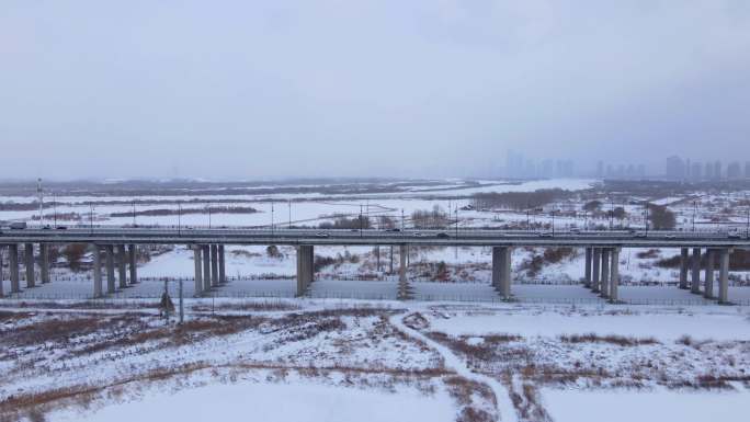 4k哈尔滨阳明滩大桥航拍冬季素材下雪