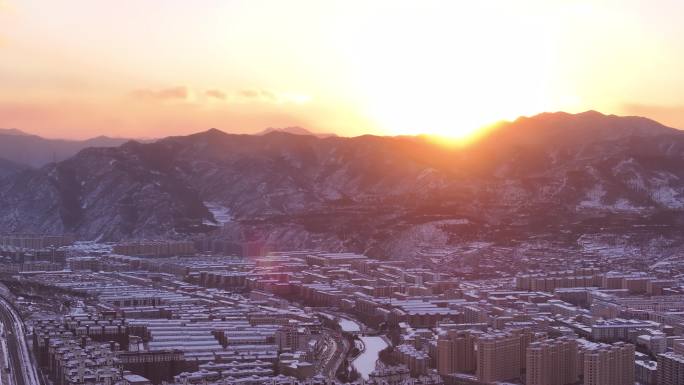 雪后晴天夕阳城市景色风光航拍