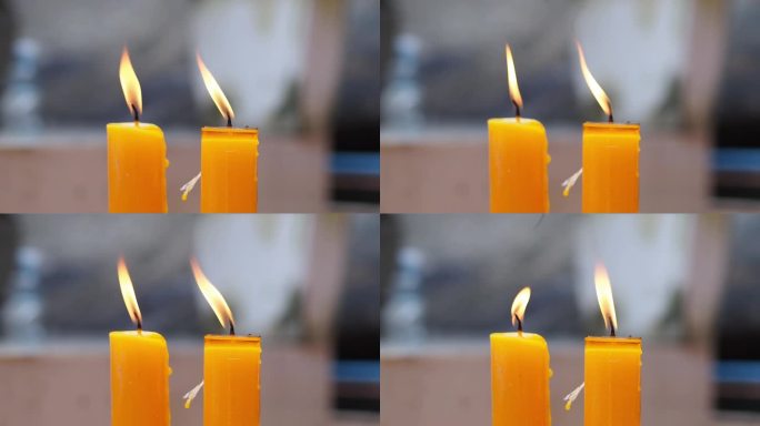 两支燃烧的蜡烛的特写