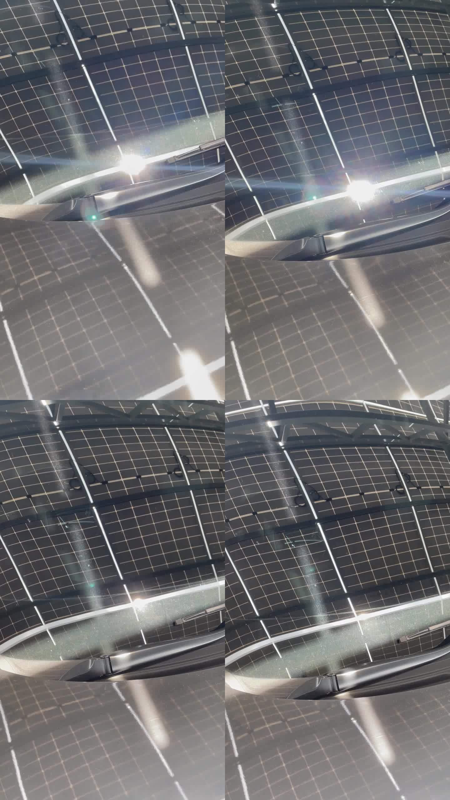 太阳能电池屋顶车库结构在汽车挡风玻璃上的反射，由太阳能产生