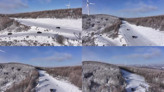 冬天风车发电雪山翠云山车队行驶