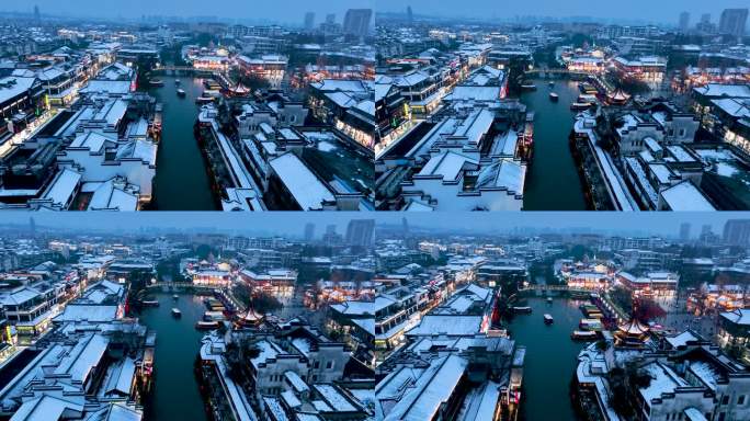 冬天南京夫子庙秦淮河的雪景夜景航拍风光