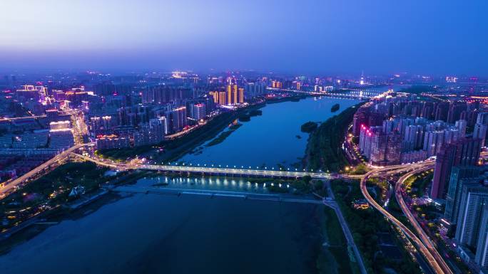 航拍洛阳城市夜景延时洛河华灯初上夜景