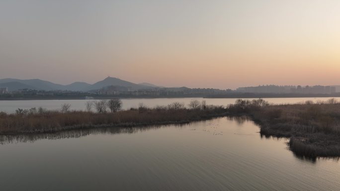 航拍襄阳汉江冬天黄昏夕阳落日城市自然风光