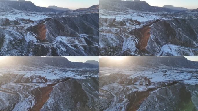 航拍北方雪后山峰湖农村