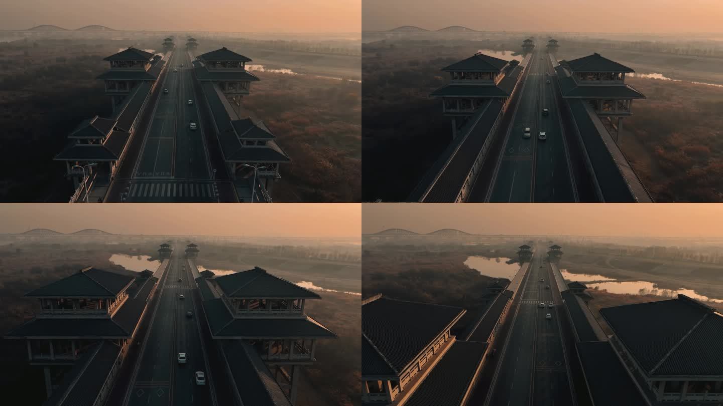 航拍晨雾中的陕西省西安市浐灞湿地灞渭桥