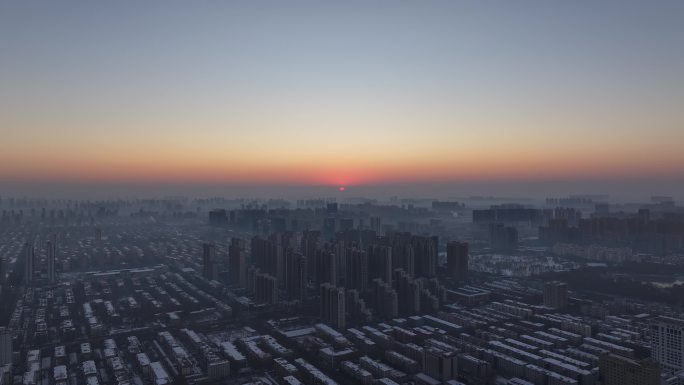 石家庄日出石家庄雪景城市雪景日出早高峰