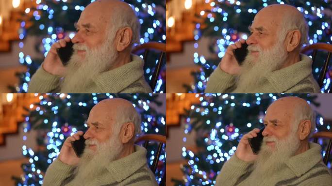 一位老人正在用手机愉快地交谈，背景是一棵美丽的闪闪发光的圣诞树。