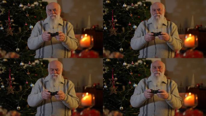 一位大胡子老人站在圣诞树旁，用双手积极地控制着操纵杆，看着屏幕。