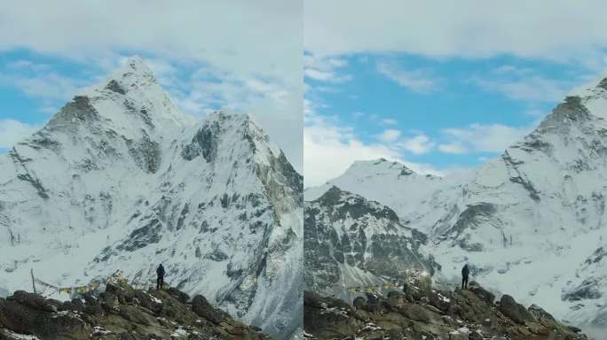 徒步旅行者和Ama Dablam山。尼泊尔的喜马拉雅山脉。鸟瞰图。垂直视频