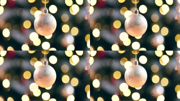 圣诞球，金色散景和闪亮的装饰与闪耀的节日，庆祝活动和节日在家里。派对装饰，魔术效果和圣诞彩纸与冬季灯