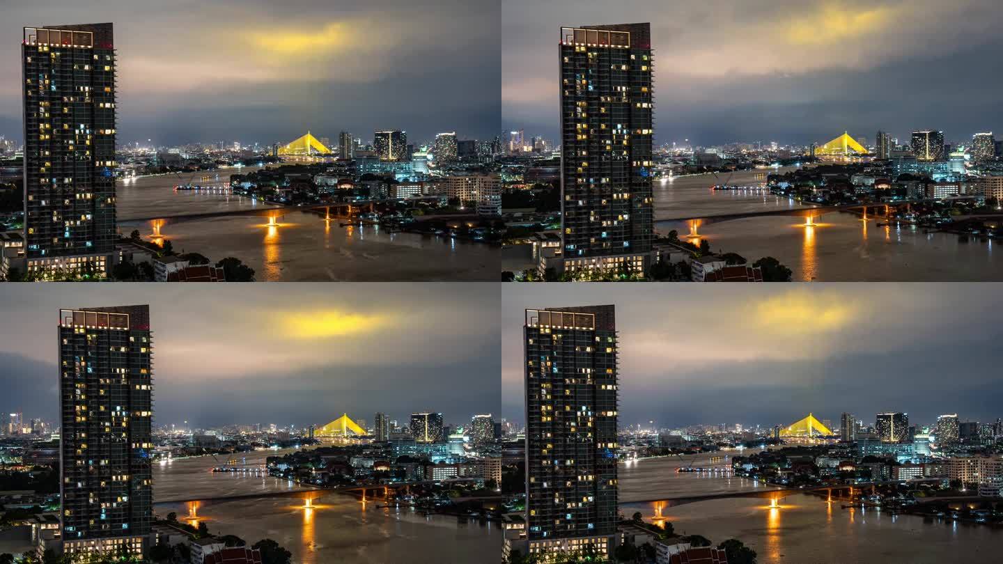 曼谷城市与Chaopraya河在夜间的航拍延时视图
