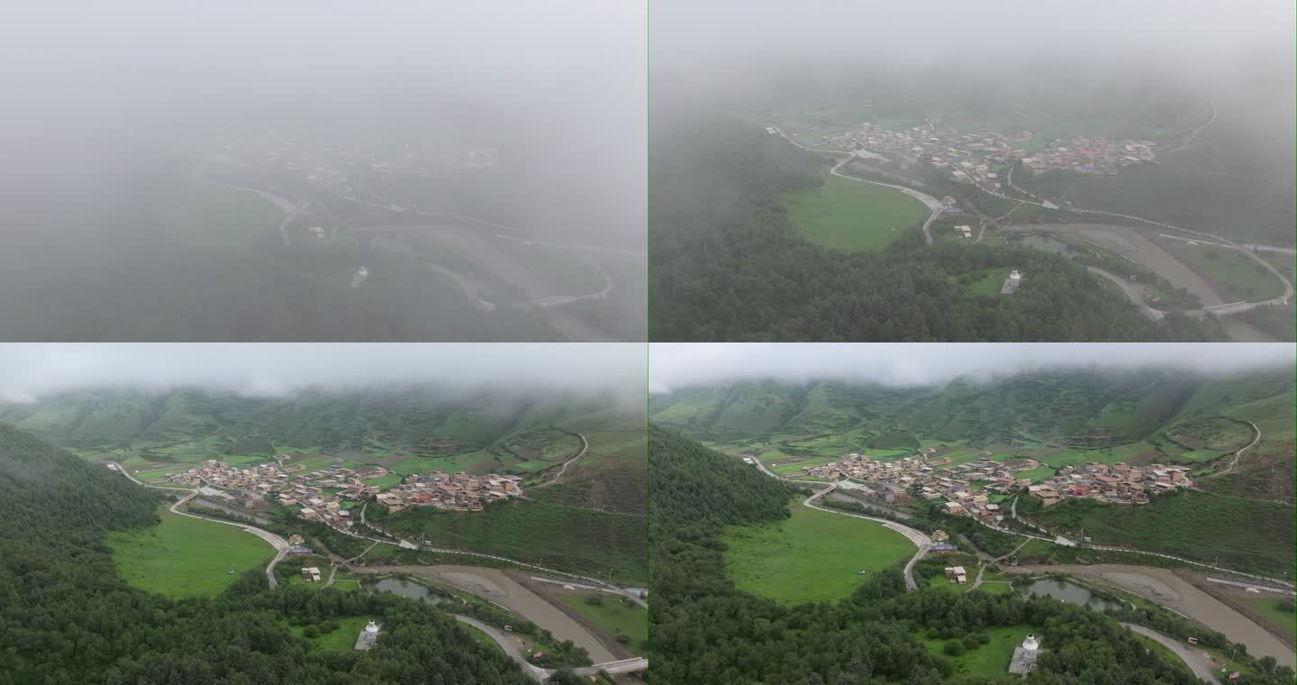 穿过云雾露出藏族小村庄