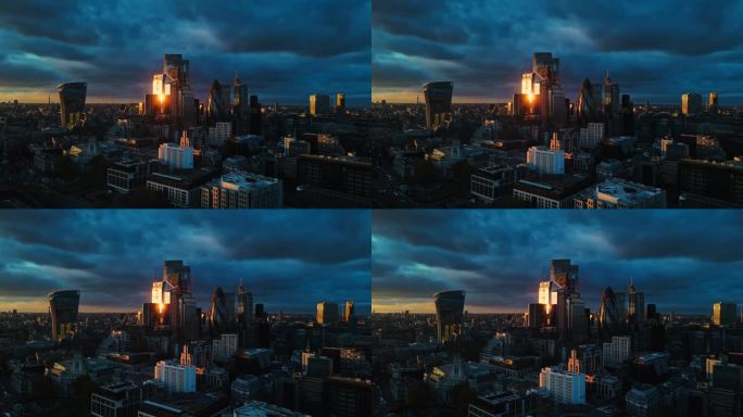 无人机拍摄的日落在伦敦摩天大楼上的倒影