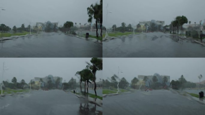 佛罗里达州圣彼得堡码头的停车场被洪水淹没。早上，飓风袭击了市中心的海滨和街道。汽车的视角，淹水的挡风