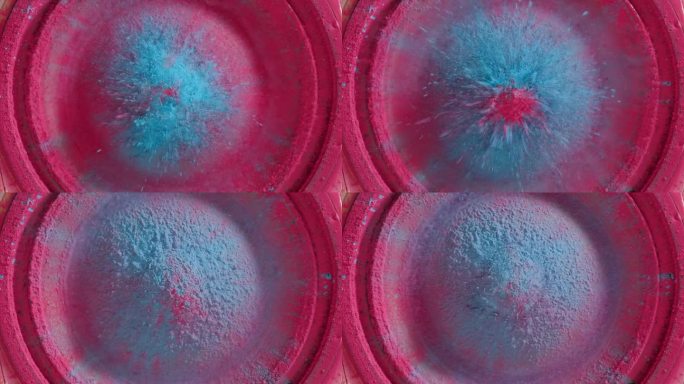 低音炮与粉红色和蓝色油漆粉末顶视图。低音扬声器，大音量音乐微距拍摄。专业的迪斯科演播室设备。音乐立体