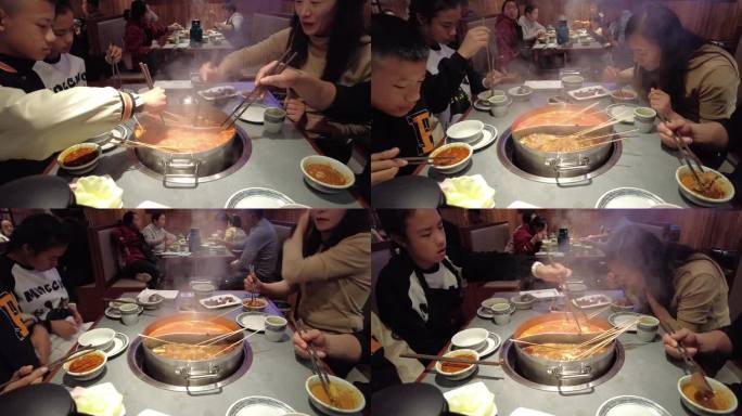 一家人在餐厅吃火锅延时摄影