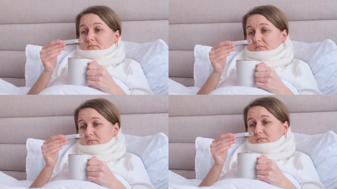 生病的女人躺在床上发高烧。感冒、流感和偏头痛。头痛的病毒。