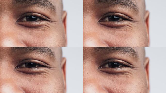 眼睛，视力和虹膜与黑人肖像在演播室变焦，医疗保健，验光或视网膜。人体，隐形眼镜和白色背景的人体特写检