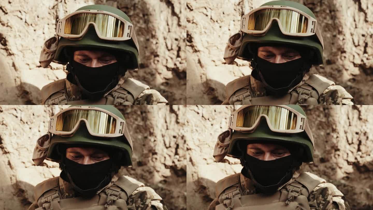 戴着头盔和战术眼镜的战士保卫他的国家