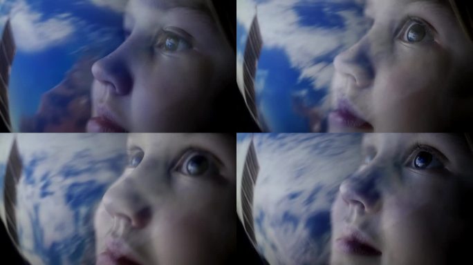 一个惊奇而快乐的孩子的脸特写，他戴着宇航员头盔，睁大眼睛从空间站看地球。天文学家的孩子