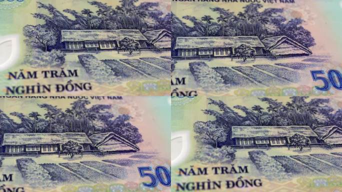越南50万越南盾纸币，50万越南盾，越南盾特写和宏观视角，跟踪和多莉拍摄50万越南盾纸币观察和储备面