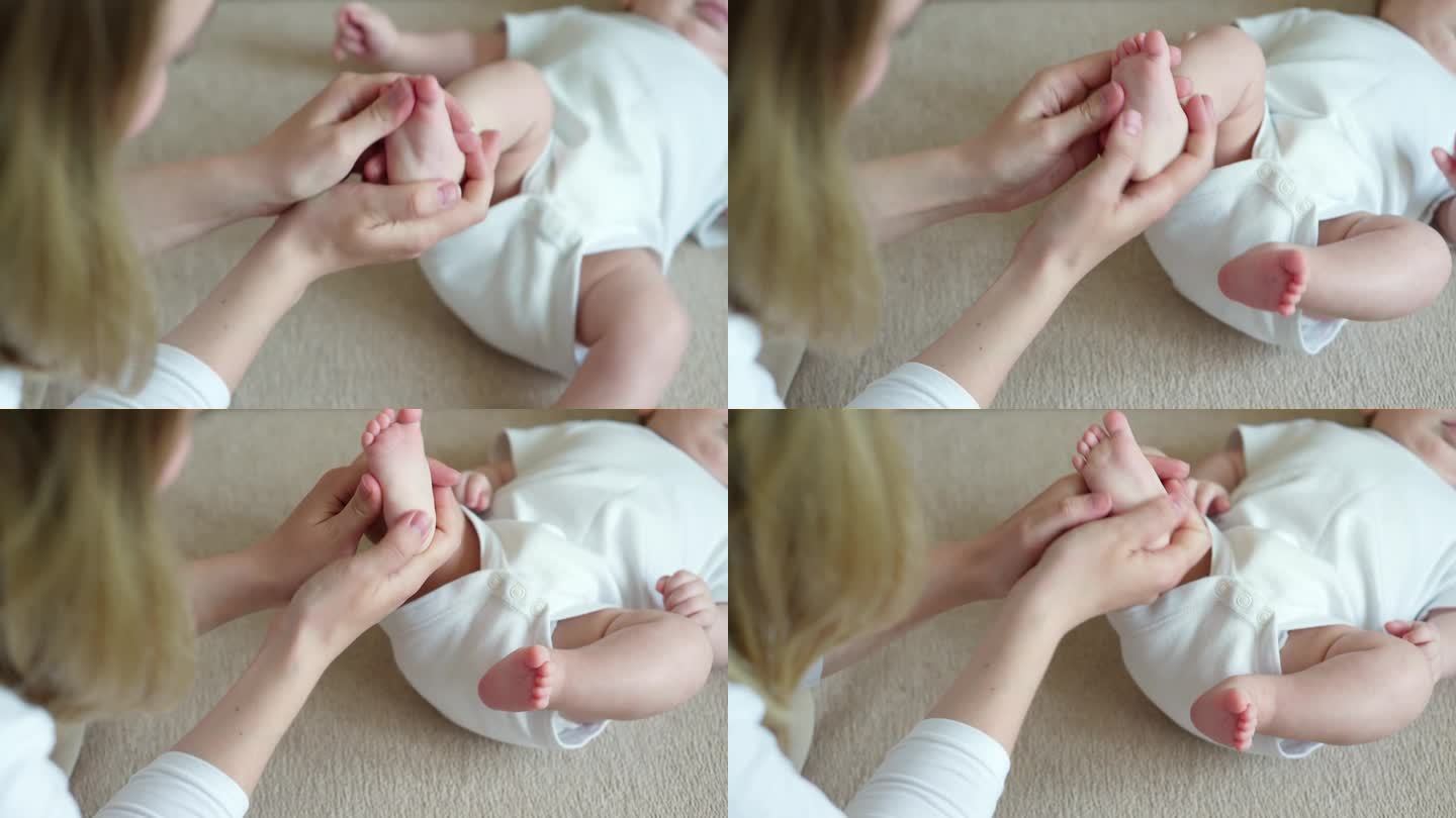 妈妈给宝宝按摩脚。产假概念，护理，婴儿按摩。预防扁平足。肌张力去除