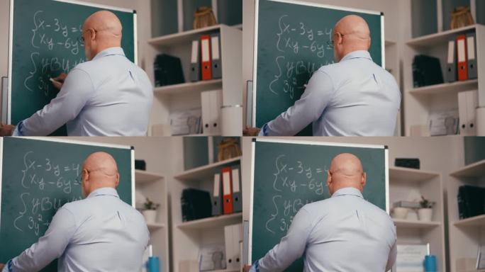 高中男老师上课时在黑板上写数学方程式