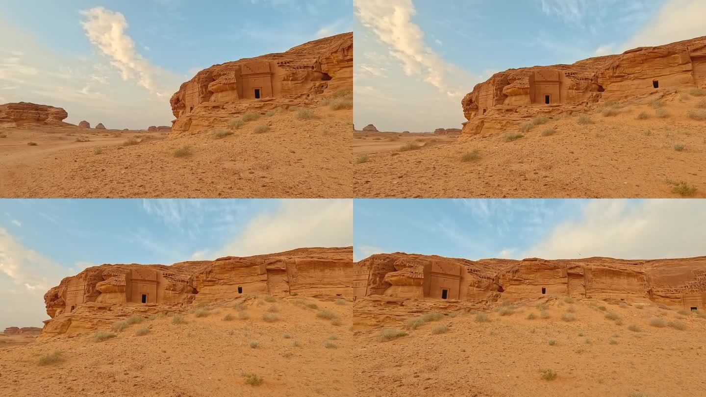 在沙特阿拉伯Hegra的Jabal Al Ahmar，橙色砂岩墙上雕刻着古老的纳巴泰建筑，这里有18