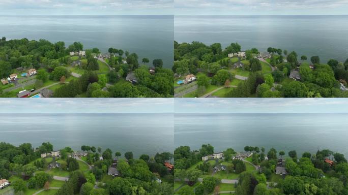 两层住宅滨水房屋在安大略湖岸边的农村生活在罗切斯特，纽约。美国梦之家是美国郊区房地产开发的典范