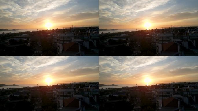 在葡萄牙里斯本一个平静的日子里，太阳在海面上缓缓落下