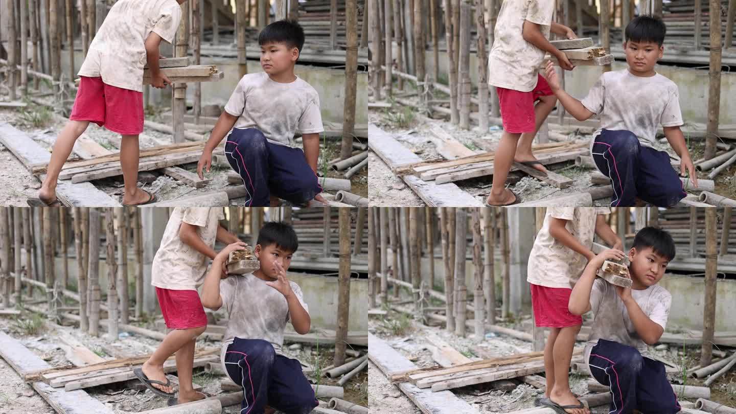 人口贩卖 建筑工地的穷孩子被迫工作。反对童工的概念。强迫儿童劳动对儿童的压迫或恐吓人口贩卖。_视频素材下载