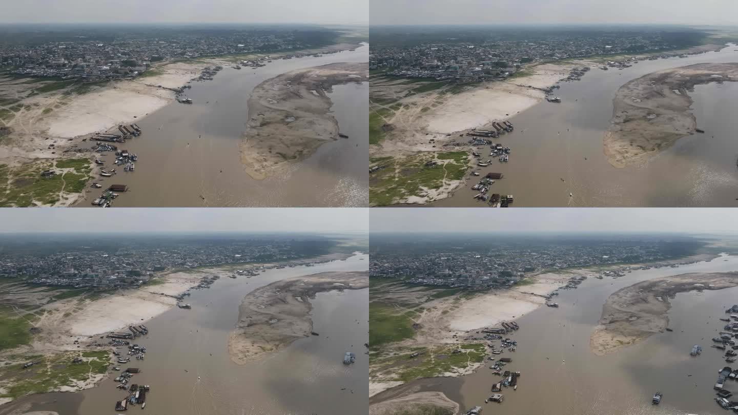 亚马逊干旱——亚马逊雨林中部小镇的航拍照片显示，随着水位下降，河流干涸，沙子堆积——气候变化问题。L