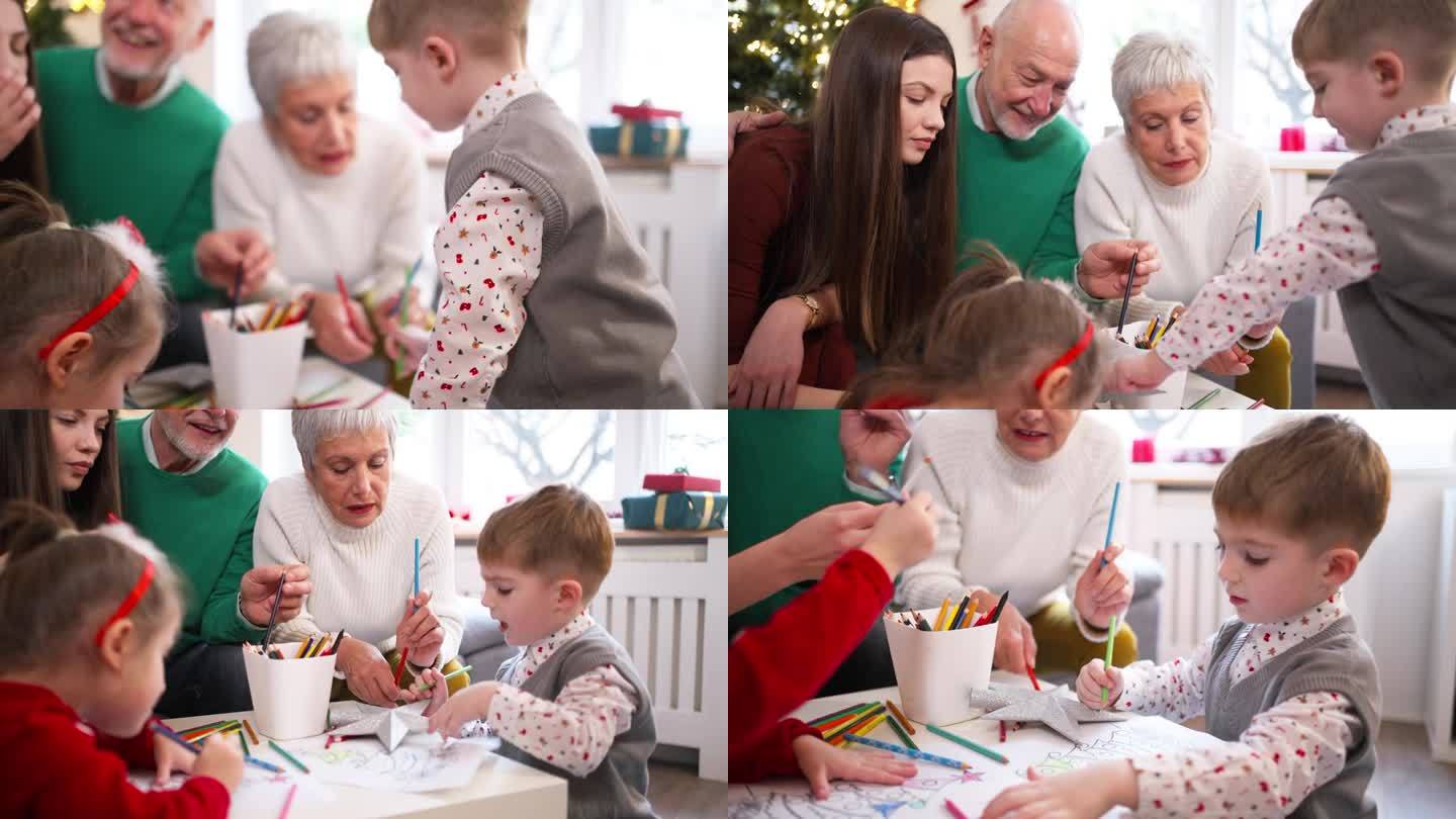 几代同堂的家庭，在圣诞节的庆祝活动中，给涂色书涂色