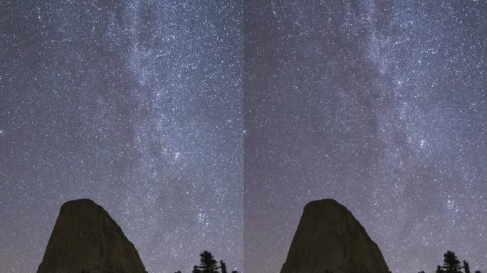 夜晚，银河在魔鬼塔丘上空。美国怀俄明州。垂直视频