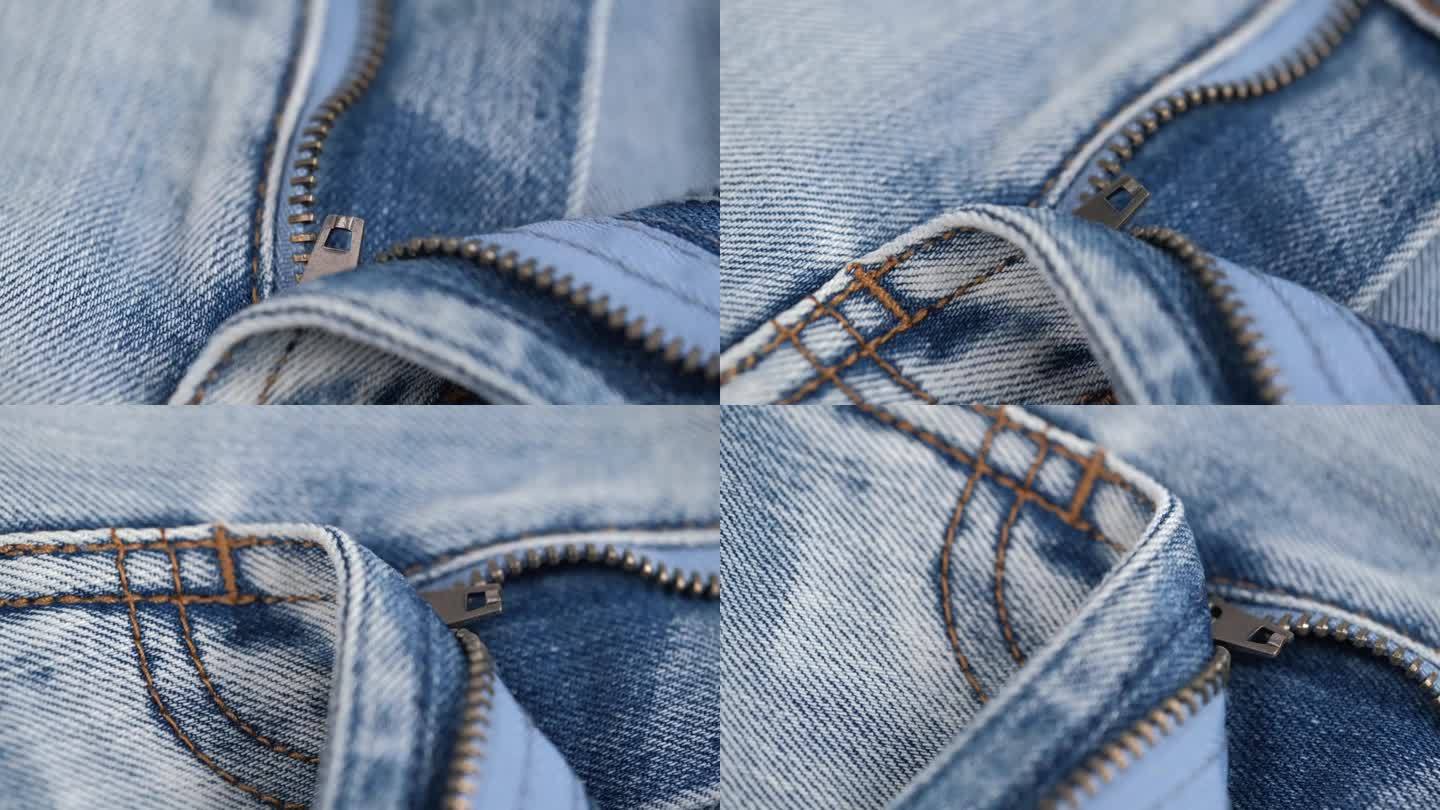 牛仔裤上拉链未扣的特写。蓝色牛仔裤的旋转面料细节。裁剪的概念。
