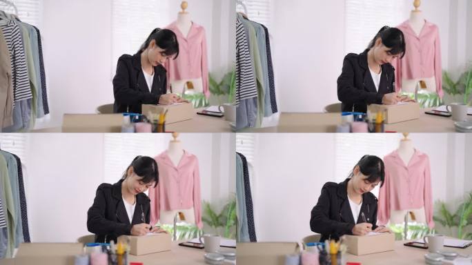 亚洲一家网上服装商店的老板是一位敬业的妈妈，她在产品包装盒上写上顾客的名字和地址，准备在家里或店里衷