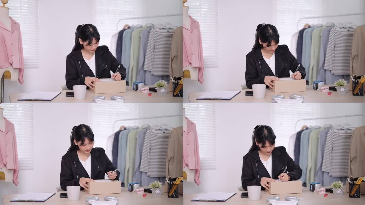 亚洲一家网上服装商店的老板是一位敬业的妈妈，她在产品包装盒上写上顾客的名字和地址，准备在家里或店里衷